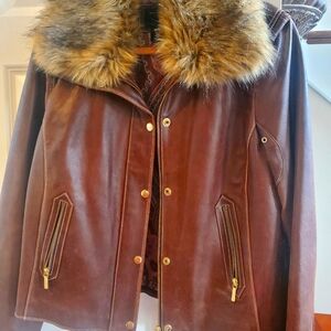 Leather bomber jacket with faux fur trim. Size Large